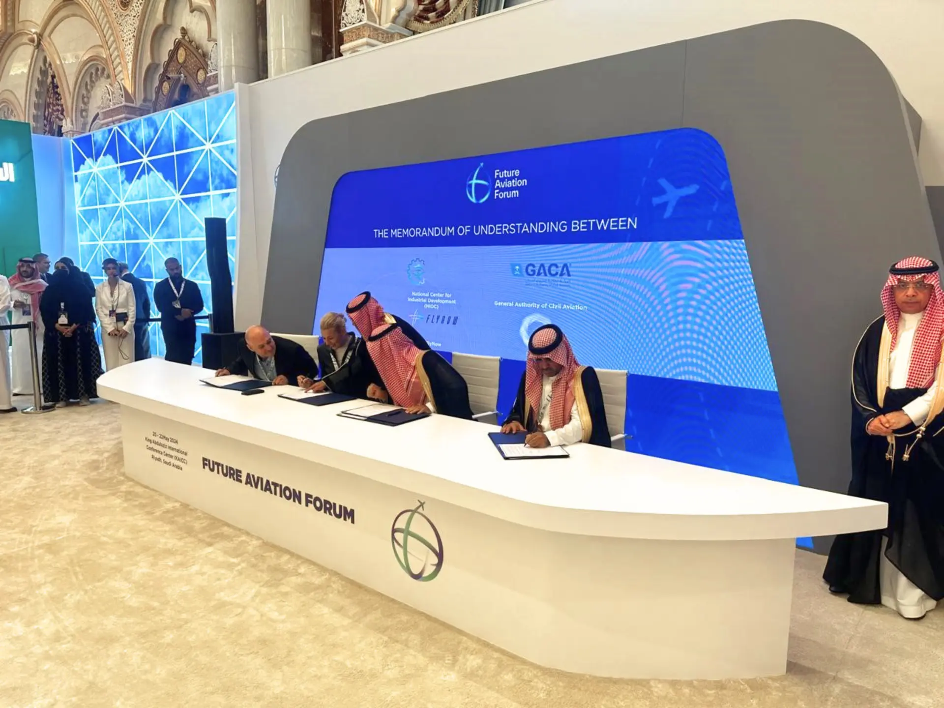 FlyNow leadership signing the agreement establishing Riyadh as the global headquarters
